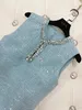 Spring New Women's Fashion French French Celebrity Small Fragrant Round Neck Sequin Hollow Out Sans manches robe courte