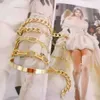 Pulseras de diseñador Hip Hop Chapado en oro Moda Cadena cruzada de metal Conjunto de mujer de 3 Conjunto de cadena gruesa Regalos de joyería