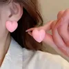 チャームピンクのアクリルツイストイヤリング