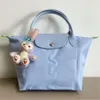 حقيبة الكتف العلامة التجارية للسيدات Longxiang Nylon Bag Bag المحمولة ذات السعة الكبيرة ذات السعة الكبيرة