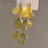 Charm Metal Ginkgo Leaf Tassel örhängen för kvinnor Europeiska och amerikanska överdrivna dingle örhängen Premium bröllop smycken gåva y240328