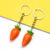 Porte-clés émulation carotte radis légume PVC résine pendentif porte-clés drôle Carota portefeuille sac à dos Dangle charmes porte-clés bijoux cadeaux