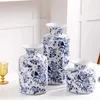 Vaser blå och vit porslin vas grön växt torr blomma arrangemang keramiskt vardagsrum foajé dekoration prydnad