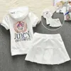 Juicy Tracksuit Ny kortärmad sportkläder Kvinnor Slim Fiting Dress Spring och Autumn Casual Sports Pleated Tennis Kjol Tvådelar Set Trendy 4039