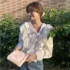 Blusas femininas Gkyocq moda coreana mulheres tops primavera babados emendados turn down colarinho manga comprida assimétrica camisa branca blusa