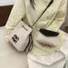 Magasins Export Designer Sacs à bandoulière Sac de grande capacité pour femmes 2024 Nouvelle toile à la mode Seau contrasté Simple et décontracté One Crossbody