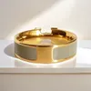 Fashion Designer Ring Womens Fashion Brand Brand 18K Gold Titanio Steel Design Ring Anello nuziale Anello nuziale Anello di gioielli versatili regalo per le vacanze