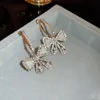 Charm Inlaid Rhinestone Bow Pearl Earrings for Women French Light Luxury High Sense Drop Earrings Personality Bowknot Jewelry Gift Y240328