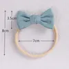 Accessori per capelli 24 Pz/lotto 2.75 "Fiocchi in Cotone Solido Fascia per Capelli per Bambini Ragazze Arco in Tessuto Fascia in Nylon Elastico Kid Hairtie