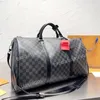 Novo designer quente mochila homens e mulheres moda mochila de viagem clássico puxar a corda abrir e fechar lona revestida de couro mochila de embarque