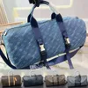 Denim Duffle Bag designer Travel Bag läder bagage handväska axel crossbody stor kapacitet tote kee pall duffel väska