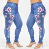 Femmes hiver belle fleur Faux Denim Jeans pantalons dames poches maigres pantalons de haute qualité vêtements grande taille L-6XL 240315