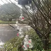 Andra fågelförsörjningar Hållbar matningsboll Anti-bee Protection kolibri matare med charmiga vindklockor läcksäker utomhus hängande för