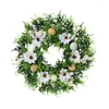 Dekorativa blommor fönster väggdekorationer och firande påskkrans väsentlig ytterdörr