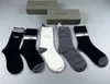 Marca designer de moda meias de algodão multicoloridas homens e mulheres combinando letras clássicas meias respiráveis misturadas futebol basquete esportes meias