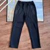 Pantaloni a gamba larga in cotone spaziale Pantaloni tecnici in pile firmati da uomo donna pantaloni con cappuccio e zip intera pantaloni sportivi windrunner giacca sportiva tasca riflettente con cordino in vita