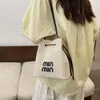 Magasins Export Designer Sacs à bandoulière Sac de grande capacité pour femmes 2024 Nouvelle toile à la mode Seau contrasté Simple et décontracté One Crossbody