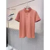 Ferragam camiseta masculina camisetas diseñador camisetas de verano de verano simplesolid negros impresiones de impresión pareja de hombres blancos camisa casual de mujeres sueltas camisetas 514