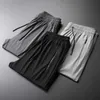 Pantaloni da uomo Estate casual da uomo elastico in vita ultrasottile seta ghiaccio freddo nero grigio pantaloni sottili elastici tessuto Lyocell liscio Pantaloni pantaloni sportivi J240328