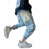 korean versi of the jeans men's trend stitching pockets harem pants winter loose expri nine-point pants blue pants autumn 83uZ#