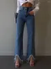 Damskie dżinsowe odzież w stylu amerykańskim łańcuch uliczny Tassel High Tallet Buttocks podnoszony szczupły i długi mikro rozkloszowany