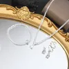 Vente en gros de bijoux transfrontaliers, collier de mariage en zircon, ensemble de boucles d'oreilles, bijoux classiques et luxueux légers, ensemble de bijoux de mariée fleurie