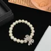 MIUM MIUM same necklace/bracelet high version designer M letter bow pearl necklace women's temperament clavicle chain