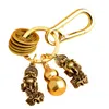 Envoltura de regalo 1 juego de colgante decorativo de latón colgante vintage artesanía llavero decoración (dorado)