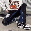 2023 Y2K -stil målade baggy svarta jeans lastbyxor män kläder rakt lapptäcke hiphop blossed denim byxor ropa hombre w5hl#