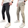 Pantalon cargo skinny multi-poches très extensible pour hommes Pantalon de survêtement multi-poches Couleur unie Travail décontracté Pantalon de jogging en plein air Q48E #