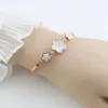 Korean Fashion Light Titanium Steel Fritillaria Three Flower Set Zirconium for Women's Small and Versatile Colorless Bracelet Jewelry