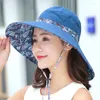 Breda randhattar 1 st dubbelsidig sol för kvinnor Enkelt blommuttryck Bow Bucket Hat Foldbar utomhus solskyddsmedel strandkapslar