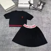 2024 Designer ladies Spring/summer fashion new letter embroidery knitted round neck slim short sleeve + Ladies luxury pleated skirt summer luxury casual 2-piece set