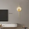 Vägglampa guld svart mässing led restaurang sovrum atmosfär minimalist