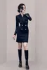 Robes décontractées Costume d'affaires à boutons noirs et vêtements pour femmes de printemps Hepburn Style Robe de tempérament français