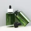 Bouteilles de stockage 50ml compte-gouttes bouteille d'huile essentielle en plastique PET noir blanc bouchon vert oblique épaule cosmétique conteneur
