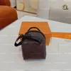 Bolsos de lujo Carteras para llaves de mujer Mini mochilas de búho Bolsas de bolsa de conejo Caja de baúl con letras marrones Monederos Llavero Bolsillo para hombre Parejas Bolsas para auriculares Dijes colgantes