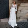 Bohemian Wedding Dr per la sposa 2021 Elegante maniche Lg pizzo vedere attraverso scollo a V una linea Sweep treno abiti da sposa M5Ty #