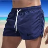 Mäns shorts Mens Luxury Brand Beach Shorts snabbtorkande rörelse Surfing Breechboch badkläder som kör sport Ocean Swimming Trunk SCANTIES Q240329