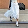 Kjolar y2k bohemisk stil vit lapptäcke lång kjol 2024 sommar tunn och löst passande ytterkläder mångsidig avslappnad