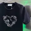 T-shirt respirant à col rond pour femmes, haut de styliste brodé de fleurs à paillettes, petit col rond, printemps 2024