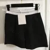 Short décontracté avec impression de lettres pour femmes, short de sport Design à la mode, taille élastique, jambes larges