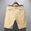 Fashion Solid Color Spliced Pockets Straight Casual Shorts Mens Clothing Summer Loose High Waist Allmatch Knee 240329