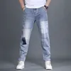 män jeans lapptäcke multi-pocket par denim byxor tiggarstil lastbyxor hög gata casual manlig streetwear pantal homme c5xe#