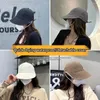 Chapeaux à large bord Chapeau de soleil pliable avec cordon de serrage Casquettes réglables Hommes Femmes Plage Peaked Summer Visières à séchage rapide Pêcheur à visage uni