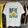 Rhude Designer T Shirt Camiseta para hombre Marca de moda de lujo Camisa Rhude Polo Suelto Transpirable Ropa estampada Grapic Algodón informal Camisas Rhude Tops de alta calidad 3436