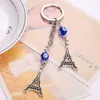 Porte-clés Bleu Evil Eye Porte-clés Bague Bijoux Tortue Tour Eiffel Porte-clés Mode Animaux Papillon Charms Porte-chaîne Pour Sacs À Main Dhhun