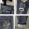 Jeans da uomo Pantaloni da cowboy uomo affusolati strappati con pantaloni con strass Pantaloni con fori grafici strappati Stampa originale Y2k streetwear Xs