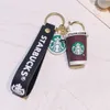 Chaveiro de designer para mulher Chaveiros de luxo acessórios Starbucks Milk Tea Cup Chaveiro anéis Pingente de carro de desenho animado Acessórios de figura de ação Chaveiro de bolsa bonito