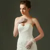 Eleganckie koronki z kości słoniowej krótkie damskie rękawiczki ślubne Cosplay Party Gloves Wedding Acories z kokardą długość nadgarstka Rękawiczki ślubne V0MD#